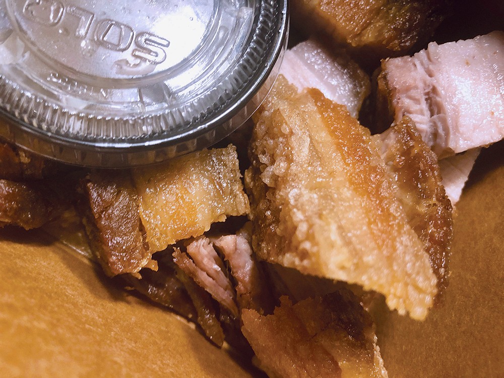 CRISPY PORK BELLY: Chef Parnass Savang seizes Southern and Thai dishes and brings them into highly edible accord. PHOTO CREDIT: Cliff Bostock
